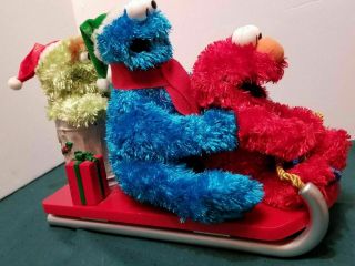 Gemmy Sesame Street Christmas Elmo,  Oscar,  Cookie Monster Sled Musical Animated