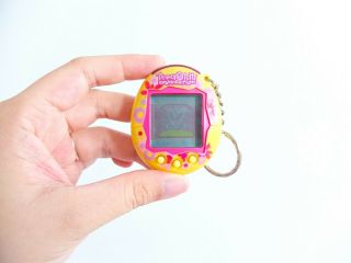 Tamagotchi Connection V2,  Yellow With Flowers,  Bandai 2004