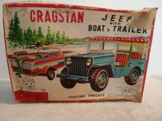 Vintage Friction Cracstan Jeep with Boat and Trailer 11