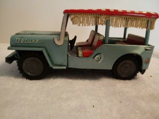 Vintage Friction Cracstan Jeep with Boat and Trailer 4