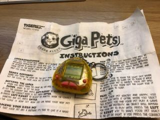 Giga Pets Compu Kitty Transparent Yellow 1997 Virtual Pet Tamagotchi Fast Ship