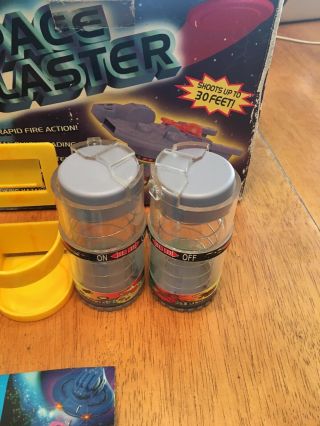 Space Blaster Disc Shooter,  1998 Min Yin toys.  W/40 foam disks,  Ammo Belt Clip 7