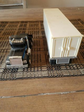 Schaper Stomper semi black mack with trailer in and lighting 3