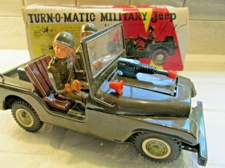 Turn - O - Matic Military Jeep 1950s Tin Toy T.  N.  Nomura Battery Operated W/box