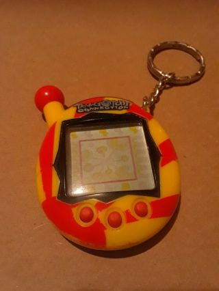 Tamagotchi Connection V4 Yellow/red Pattern Bandai 2004 Vintage Toy