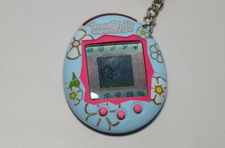 Bandai Tamagotchi Connection 2004 (Light Blue w/ Flower Design) Virtua Pet 4