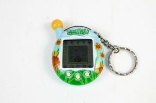 Tamagotchi Connection V4 Light Blue With Sunflowers Fully Fresh Battery