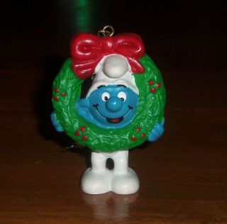 Smurfs - Christmas Ornament - Smurf With Wreath Peyo 1981 Gold Cord Pvc Plastic