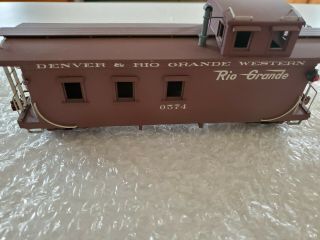 On3 D&RGW Brass Long Caboose 0574,  painted 3