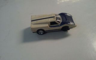 G - 28 Vintage Aurora Slot Car Ford White And Blue,  Side Of Car Is Missing
