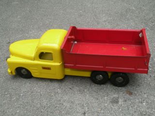 Vintage 1950 ' s Structo Dumping Utility Dump Truck w/Fireball Motor,  Red & Yellow 2