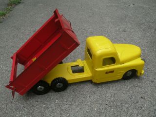Vintage 1950 ' s Structo Dumping Utility Dump Truck w/Fireball Motor,  Red & Yellow 3