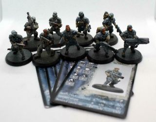 At - 43 28mm Una Steel Troopers X9 W/ Special Weapons Rackham With Cards