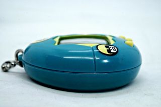 Tamagotchi Bandai Teal Blue Yellow / Case 1996 Bandai Virtual Pet TMGC 6