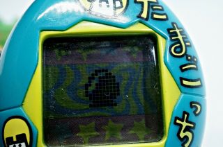 Tamagotchi Bandai Teal Blue Yellow / Case 1996 Bandai Virtual Pet TMGC 8