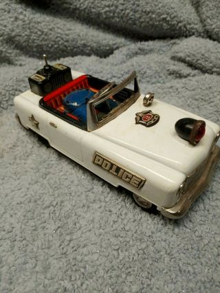 Vintage TN,  Tin Litho Police Patrol Convertible Bump N Go,  Battery Operated 2