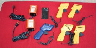 2 Aurora Model Motoring Power Packs,  1 Track Clip & 5 Hand Controllers