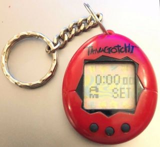 1997 Bandai Tamagotchi Red Black Virtual Pet Keychain
