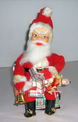 Vintage Japan Tin Battery Op.  Santa Claus Sitting On House