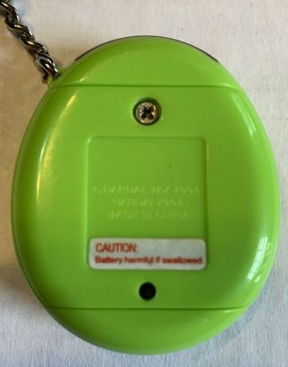 2004 Tamagotchi Connection V1 Bandai Green Orange Virtual Digital Pet Keychain 2