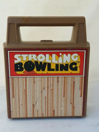 Tomy Strolling Rolling Wind Up Bowling Ball Game