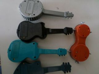 Micro Jammers Cap Toys Guitar (3) Banjo (1) Bongo drum (1) ALL WORK 7
