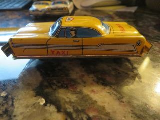 1960s Tin Litho Friction Japan Plymouth Yellow Cab Taxi Car