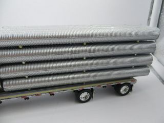 1/64 DCP (Die Cast Promotions) Kenworth Pacific Corrugated Pipe Co.  with Load 3