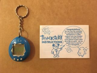 Vintage 1997 Tamagotchi Blue With Silver,  With Instructions