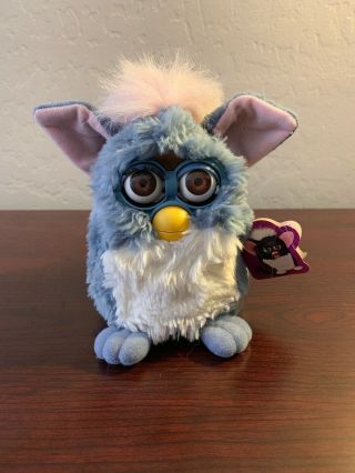 Furby 70 - 800 Gray,  White,  And Pink Needs Repaired Parts Only