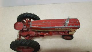 Toy Ertl or Eska Farmall 560 row crop tractor with a fast hitch 4 6