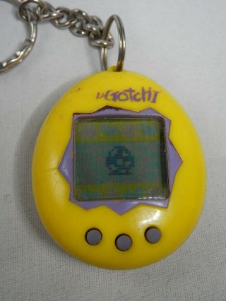 Vintage Virtual Pet Keychain TAMAGOTCHI Bandai Yellow Purple 3