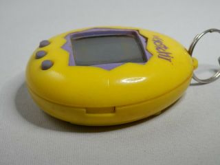 Vintage Virtual Pet Keychain TAMAGOTCHI Bandai Yellow Purple 5