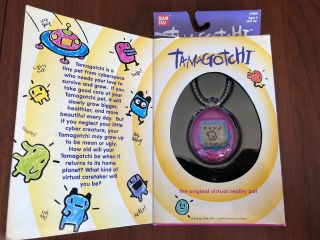 1996/1997 Bandai Tamagotchi Virtual Pet Purple/blue