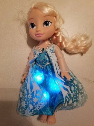 Jakks Pacific Disney Frozen Snow Glow Elsa Doll Dress Lights Up & Sings & Talks