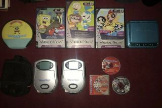 Video Now Lot; Personal Video Players With 5 Colored And 3 Black And White Discs