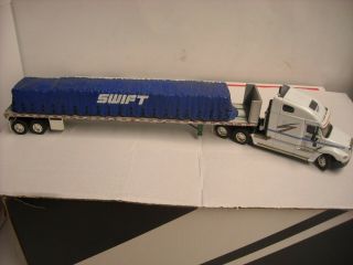 Dcp Swift Logo Freightliner W/flatbed Trailer W/swift Tarp Load Combo
