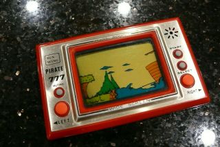Sunwing Pirate 777 Vintage Electronic Handheld Lcd Video Game And Watch ✨good✨