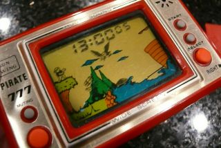 Sunwing Pirate 777 Vintage Electronic Handheld LCD Video game and watch ✨GOOD✨ 4