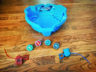 Beyblade Starter Kit (includes 4 Beyblades 2 Launchers,  2 Ripcord And 1 Stadium)