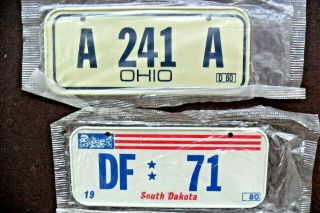 1980 Ohio / South Dakota Post Honeycomb Cereal Mini Bicycle License Plate X2