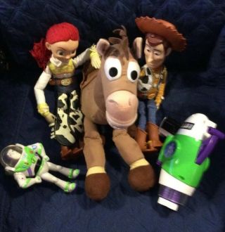 Disney Pixar Toy Story Woody,  Jessie,  Bullseye.  Buz Gun,  And Small Buz