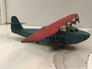 Vintage Wyandotte China Clipper Pressed Steel Red and Blue Airplane 2