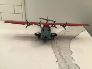 Vintage Wyandotte China Clipper Pressed Steel Red and Blue Airplane 4