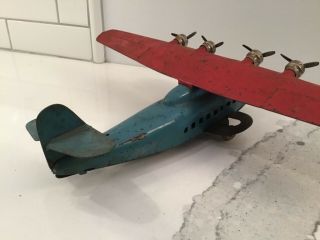 Vintage Wyandotte China Clipper Pressed Steel Red and Blue Airplane 7