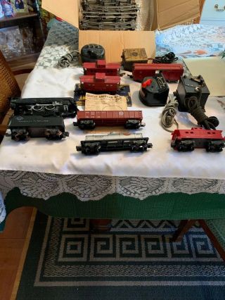 American Flyer Toy Train Set And Extra Tracks Plus A Set Of Remote Control Swit