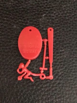 Cracker Jack Swinging Monkey Put Together Toy - Red Plastic On Sprue