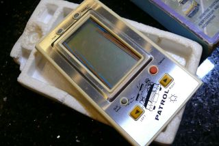 BRONZA POLICE Vintage LCD Electronic Handheld Arcade Game and Watch ✨WORKS✨ 2