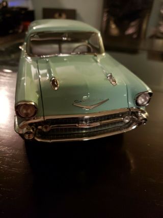 1/18 SCALE DIECAST 1957 CHEVY 150 UTILITY SEDAN IN GREE BY HIGHWAY 61. 2