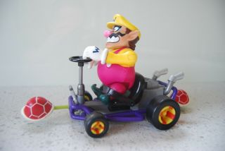 Nintendo 64 Mario Kart 64 Pull Back Action Figure Toy Biz 1999 - Wario